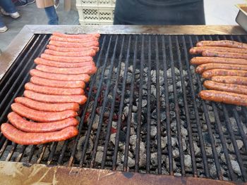 High angle view of meat on barbecue grill