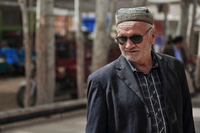 Portrait of man standing outdoors