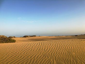 Scenic view of desert against sky