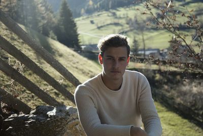 Portrait of young man looking at camera