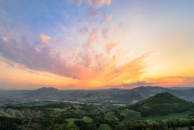 Scenic view of mountains against sky during sunset