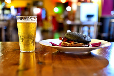 Close-up of beer in glass on table