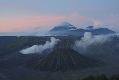 Panoramic view of volcanic landscape against sky during sunset