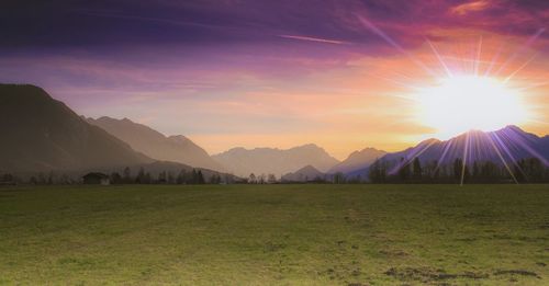 Scenic view of landscape against sky during sunset