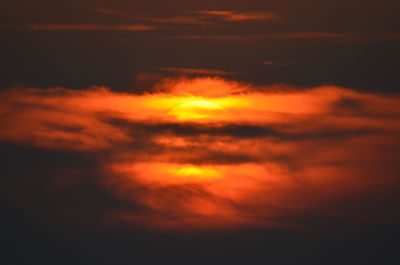 Low angle view of dramatic sky during sunset
