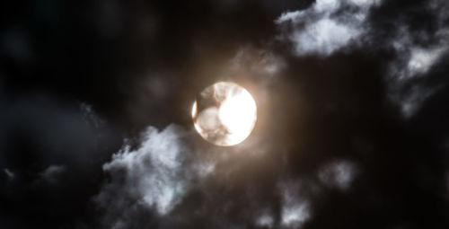 Low angle view of moon against sky