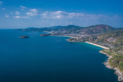 Aerial view of sea and bay against sky