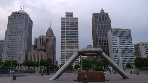 Modern buildings in city against sky