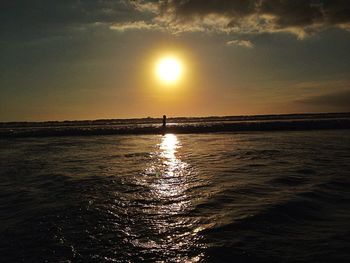 Scenic view of sea at sunset