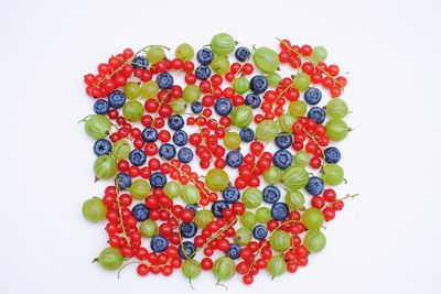 Close-up of fruits against white background