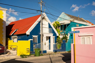 Colored houses in front of the sky