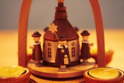 Close-up of figurine on table