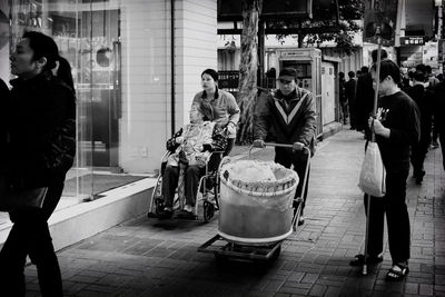 People at street market in city at night