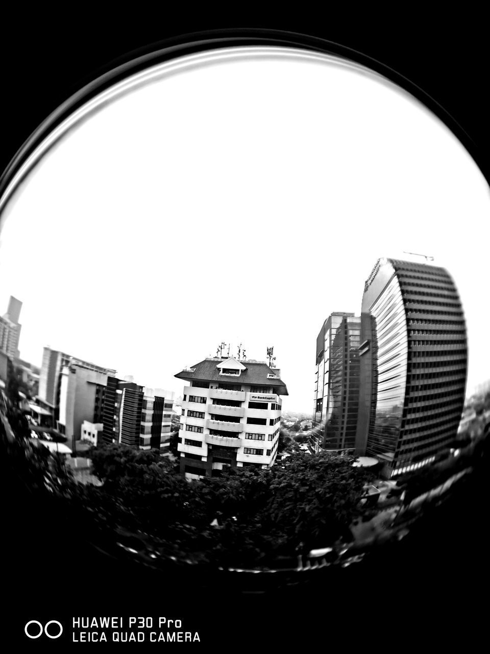 LOW ANGLE VIEW OF BUILDINGS AGAINST SKY