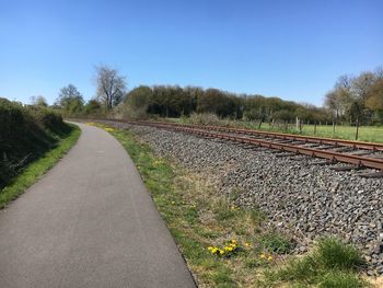 View of railroad tracks against clear sky