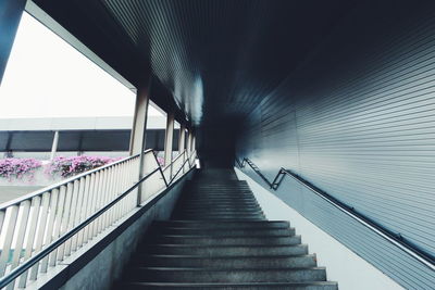 Low angle view of empty footbridge