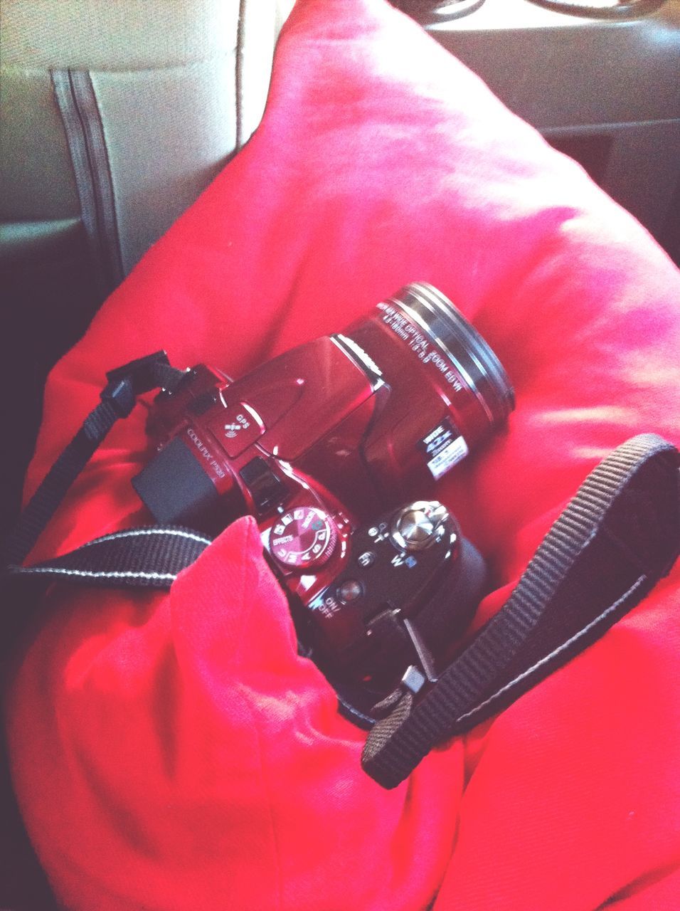 red, indoors, high angle view, close-up, car, transportation, land vehicle, technology, no people, mode of transport, still life, day, metal, part of, stationary, travel, old-fashioned, music, protection, absence