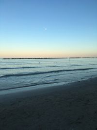 Scenic view of sea at sunset