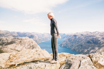 Woman standing on mountain
