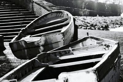 Abandoned boat moored in lake