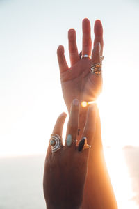 Cropped image of hand against white background