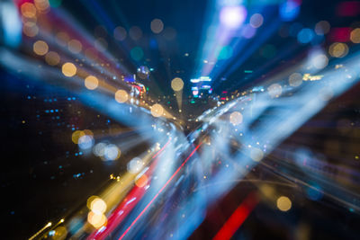 Defocused image of illuminated lights at night