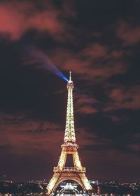 Low angle view of illuminated tower during sunset