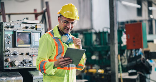 Man working with mobile phone