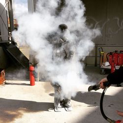 Man smoking on street