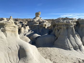 Panoramic view of rock formations against sky