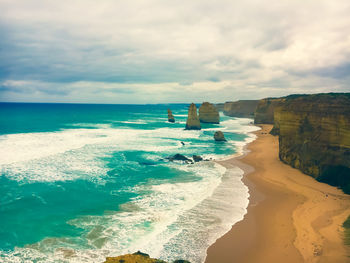Scenic view of beach against sky