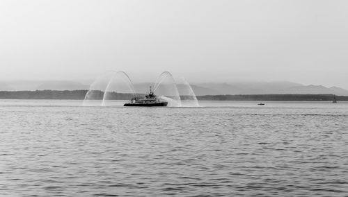 A fire boat sprays water near seattle.