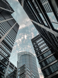 Low angle view of modern buildings against sky