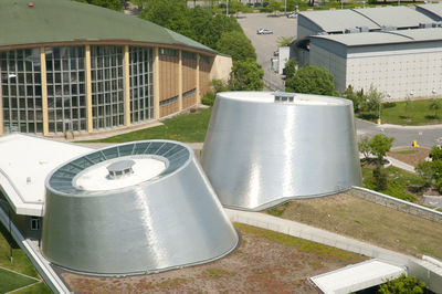 High angle view of garbage bin against building in city