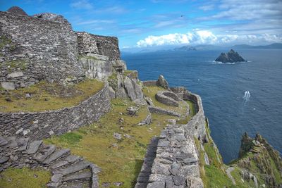 Old ruins at skellig michael against sky