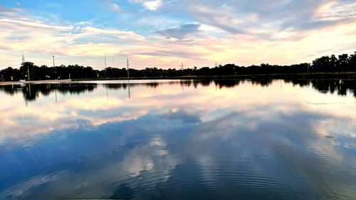 Reflection of trees in calm lake