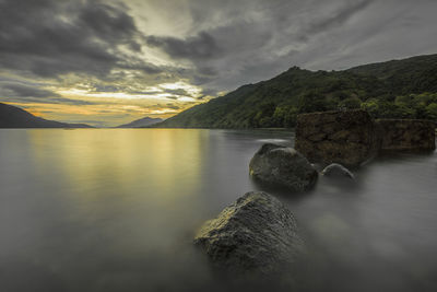 Scenic view of sea against sky during sunset