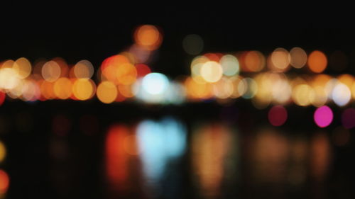 Defocused image of illuminated lights at night