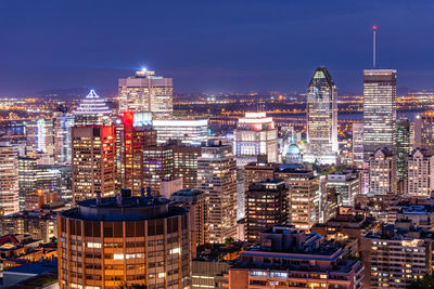 Illuminated buildings in city at night