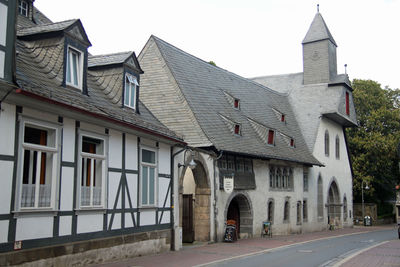 Street amidst buildings against sky