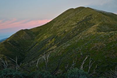 Scenic view of mountains against sky during sunset