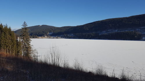 Scenic view of lake against clear sky