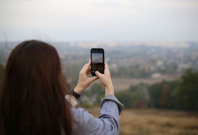 Young woman using mobile phone