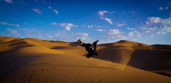 Scenic view of desert against sky