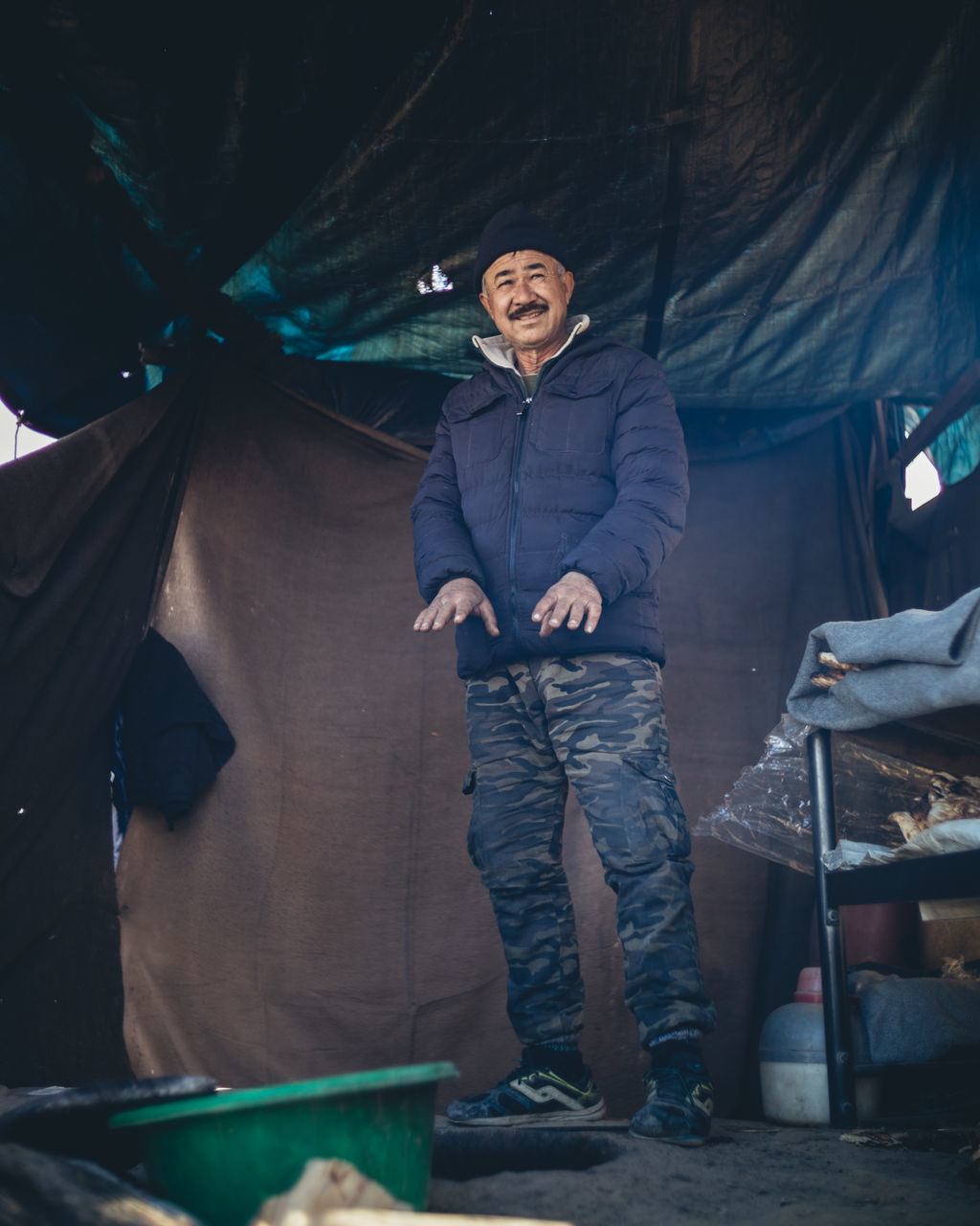 blue, adult, men, one person, standing, full length, performance, occupation, front view, stage, portrait, looking at camera, performance art, clothing