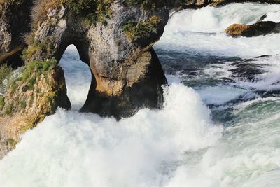 View of rock formation in sea