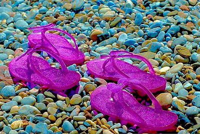 Close-up of colorful pebbles on beach