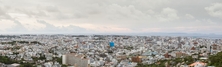 Panoramic view of cityscape against sky