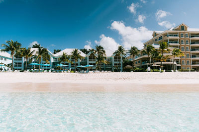 View of swimming pool against cloudy sky