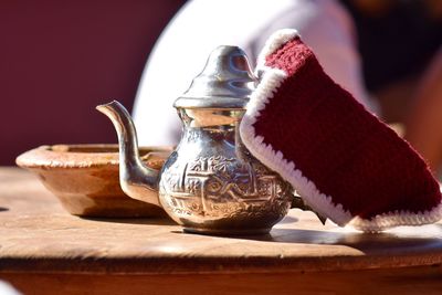 Close-up of shoes on table